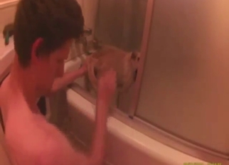 Royally fucked-up enema play vid with a dog